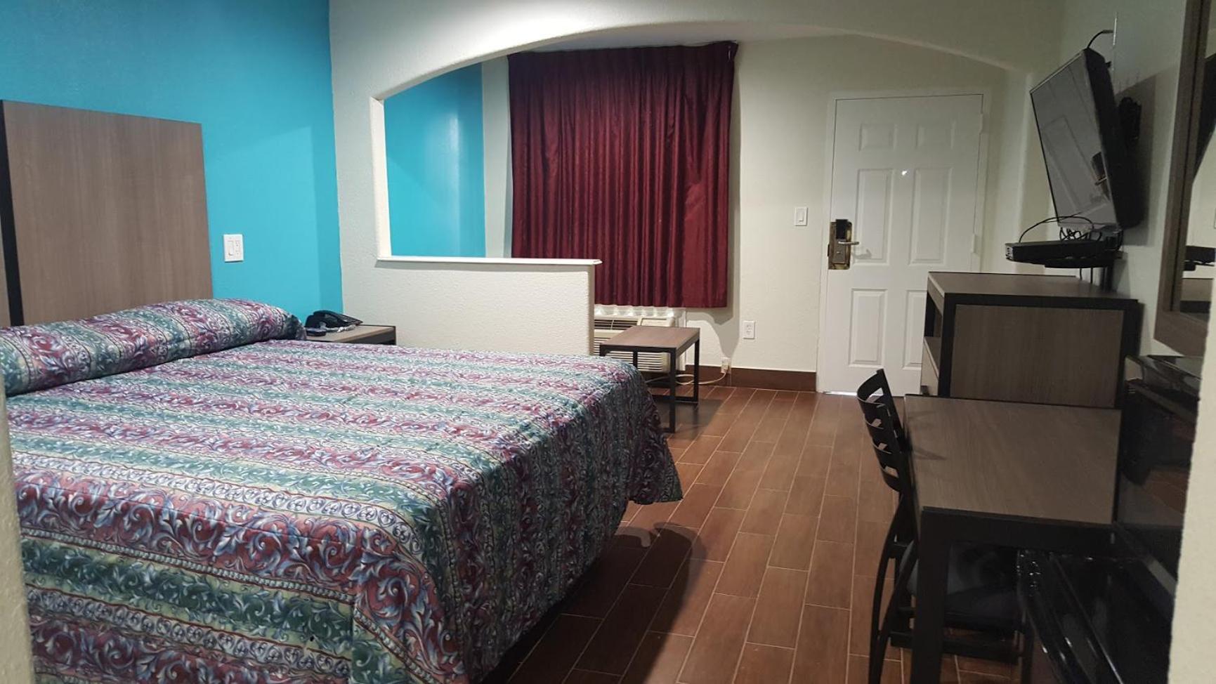Moonlight Inn & Suites Jersey Village Habitación foto