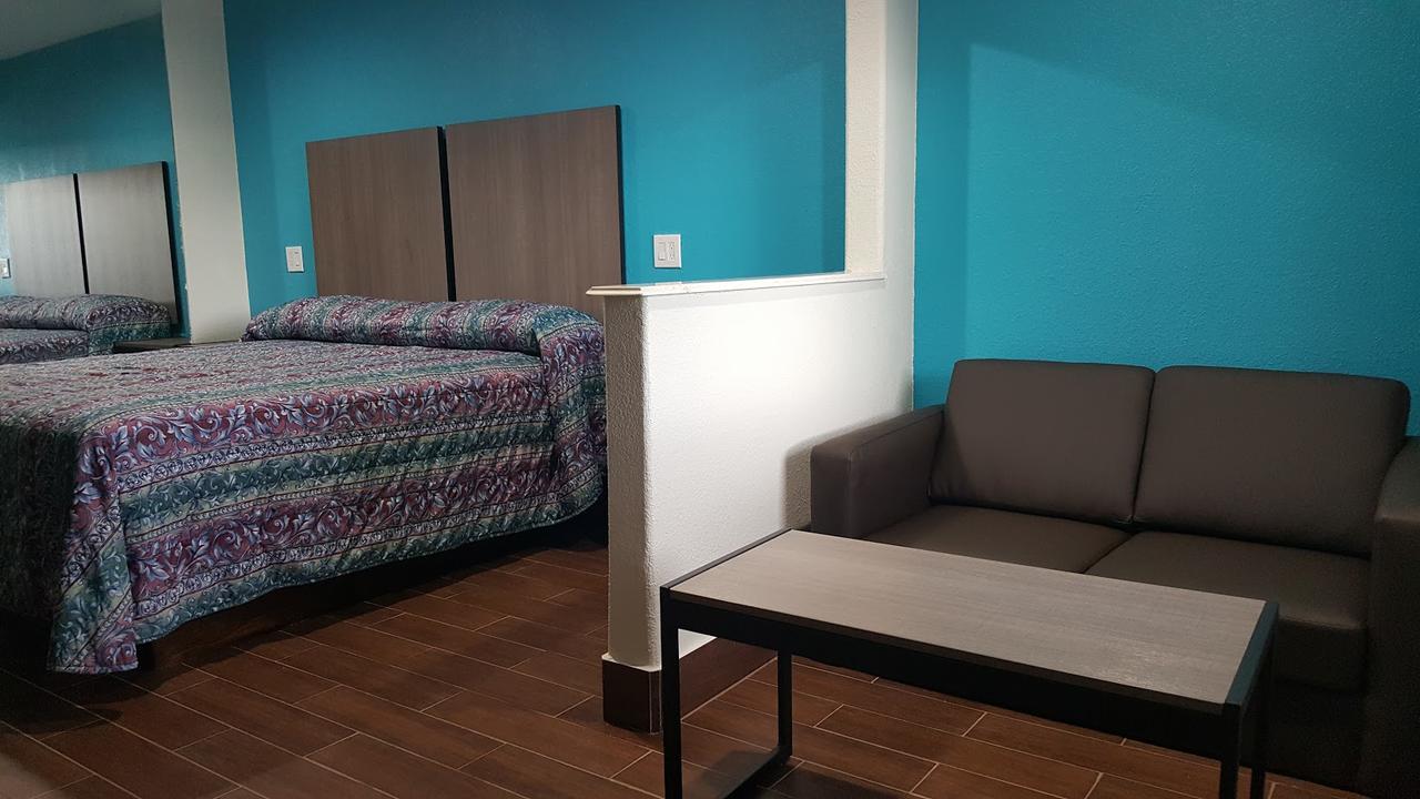 Moonlight Inn & Suites Jersey Village Habitación foto